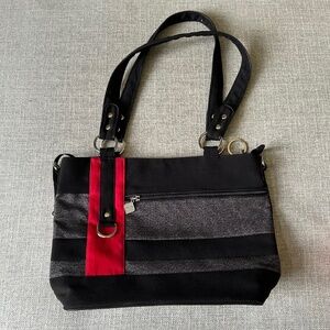 Jak's "Prêt a Oser" black grey and red fabric handbag